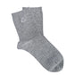 Close-up of a pair of plain grey cotton socks