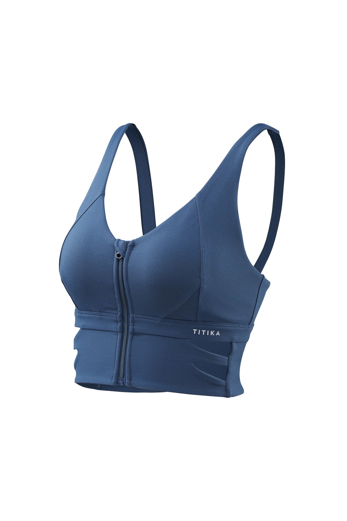 Front view of a woman wearing Titika Active Wear’s vibrant, sleeveless turquoise tank top with a scoop neckline, perfect for a stylish and comfortable workout.