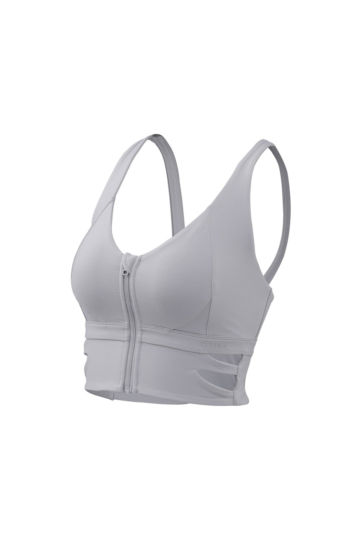 Front view of a woman wearing Titika Active Wear’s vibrant, sleeveless turquoise tank top with a scoop neckline, perfect for a stylish and comfortable workout.